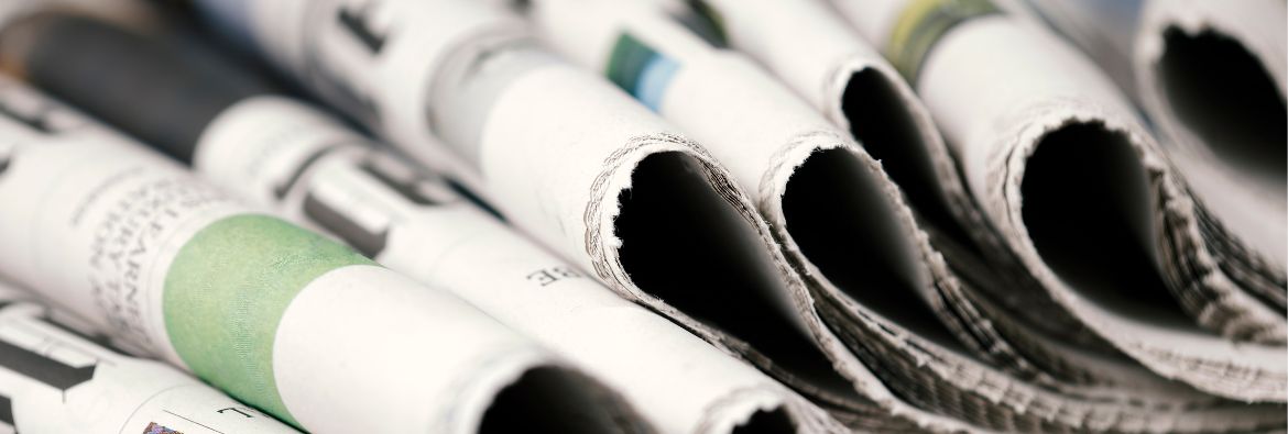 Folded newspapers