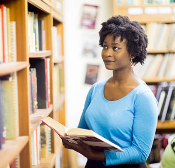 student in a library