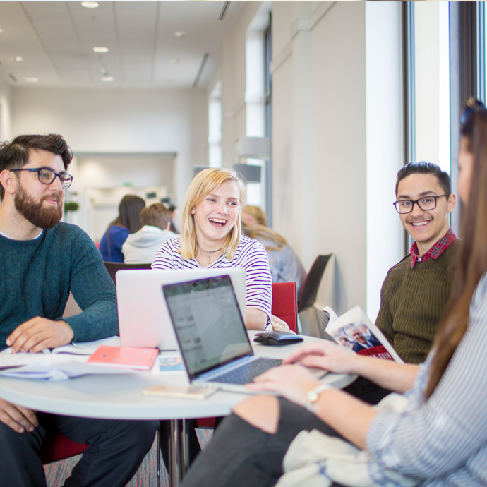students speaking together in a group 
